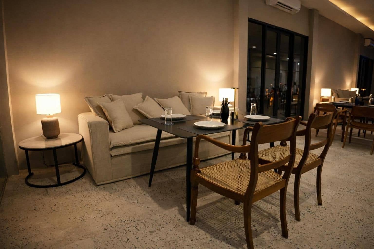 Café lounge with sofa seating and table lamps