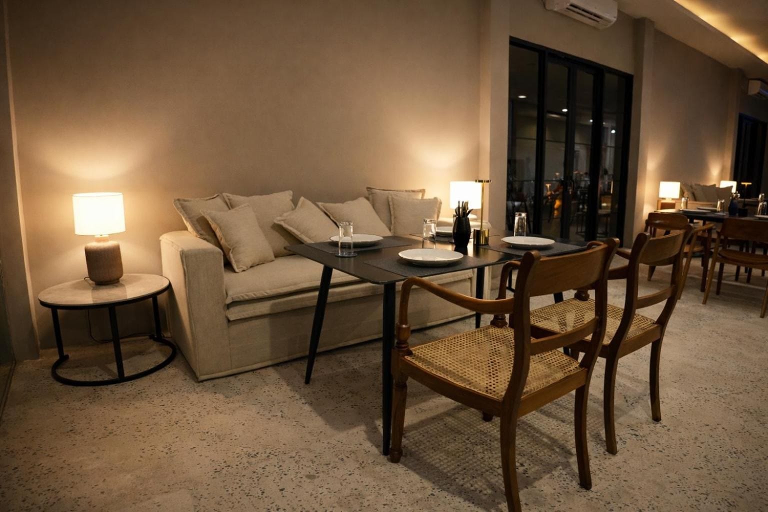Café lounge with sofa seating and table lamps